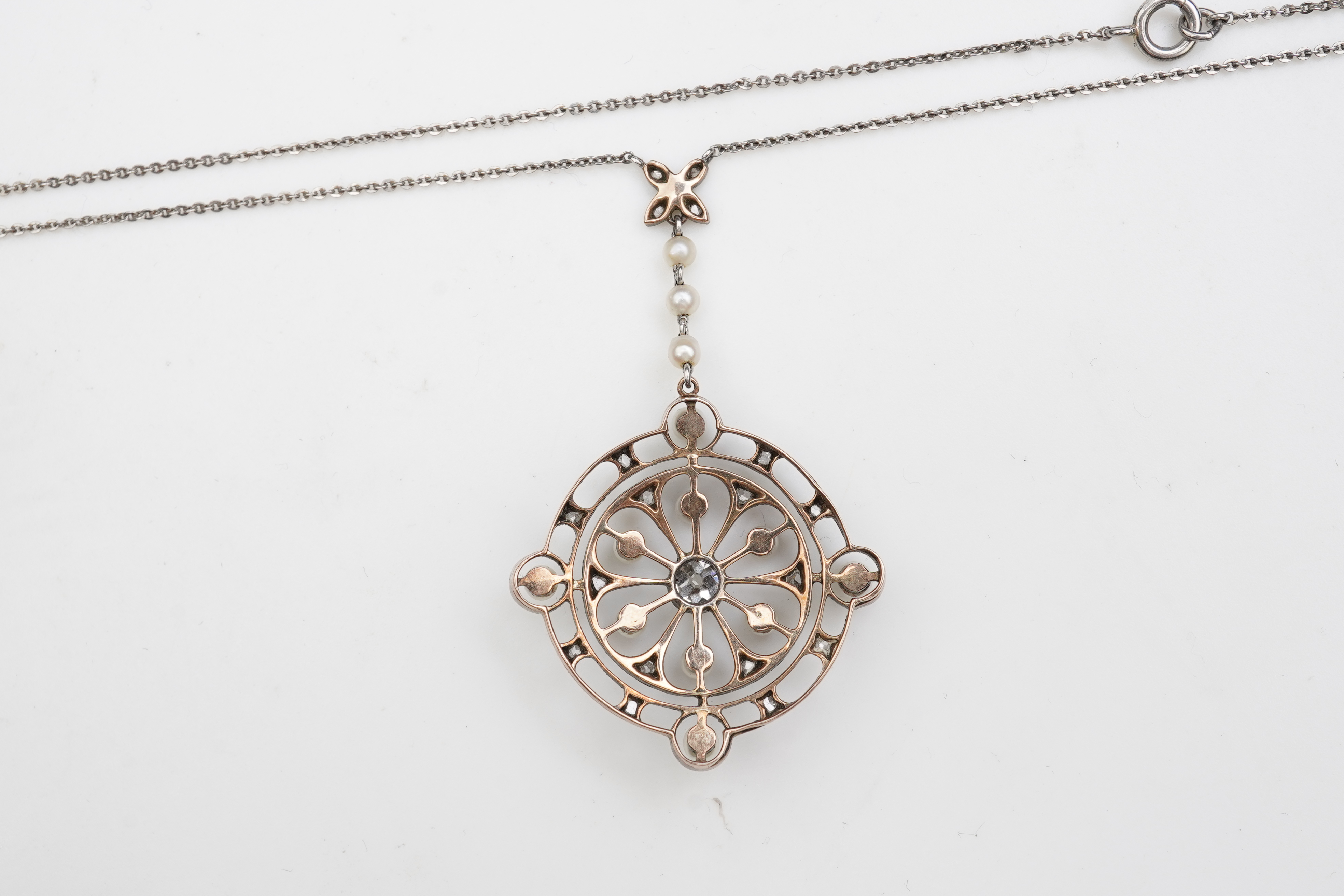 An Edwardian diamond and pearl pendant, early 20th century